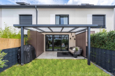 Ansicht Garten mit Terrasse und großer Pergola - Großzügiges Reihenmittelhaus zum Wohlfühlen in familienfreundlicher ruhiger Wohnlage